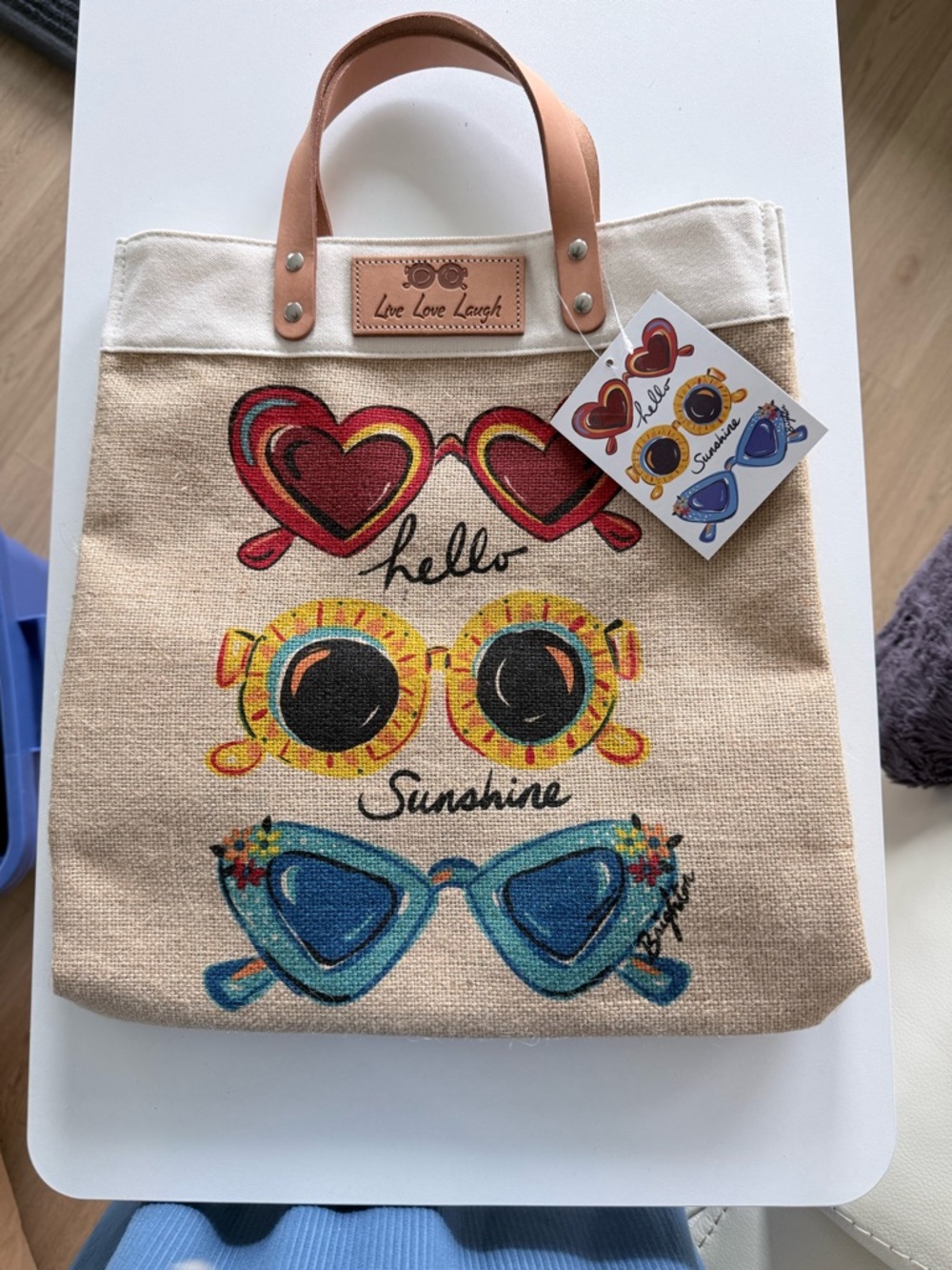 Brighton Sun Shades Canvas Tote with Heart, Yellow and Blue Sunglasses Artwork.